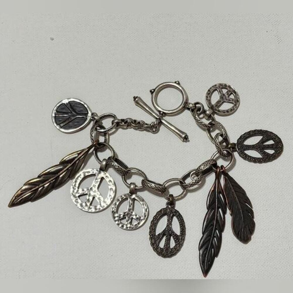 Lucky brand hammered silver tone peace and love‎ feather boho charm bracelet